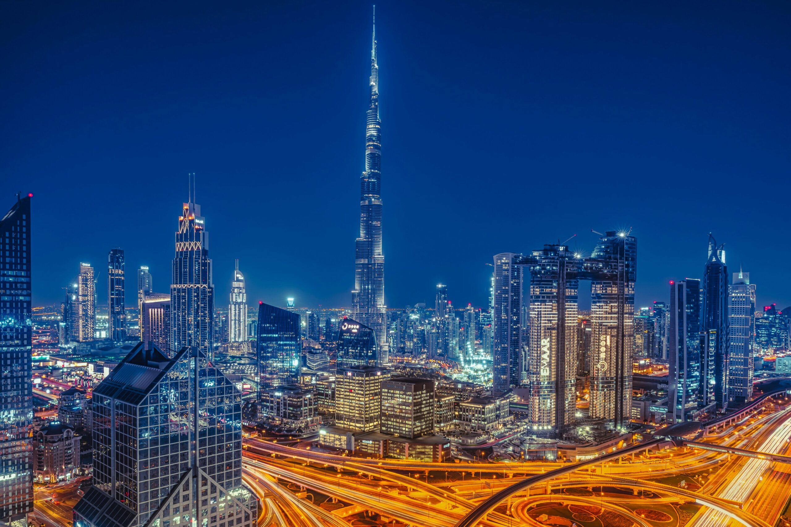 A community of villas and townhouses in Dubai with the city skyline in the background
